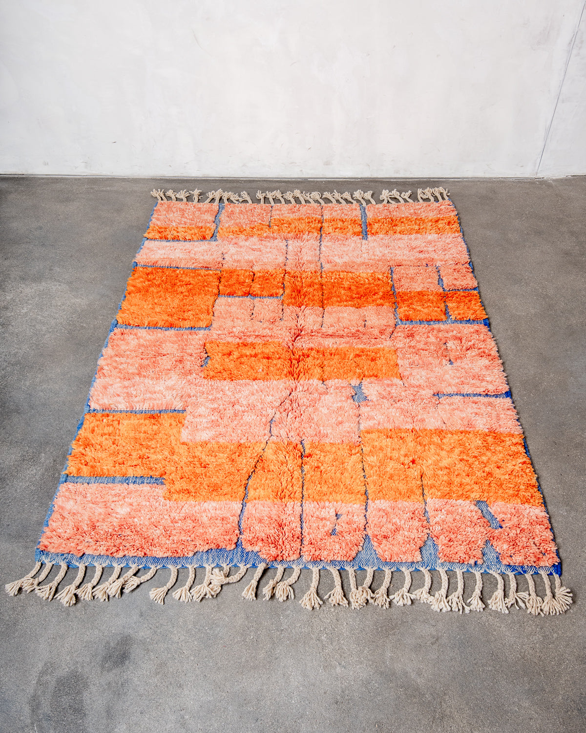 Modern, designer, handcrafted Berber rug from Morocco. Beniourain carpet with beautiful colours and patterns and fluffy wool texture.